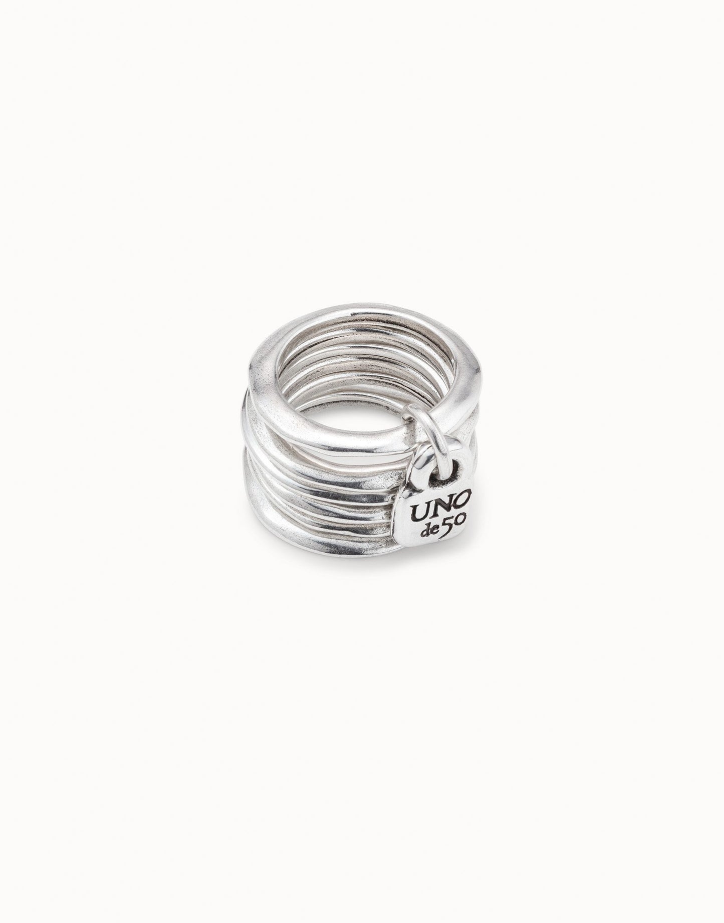 Uno Multi row ring with a charm