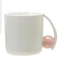 Stoneware mug with Pink Ball Handle